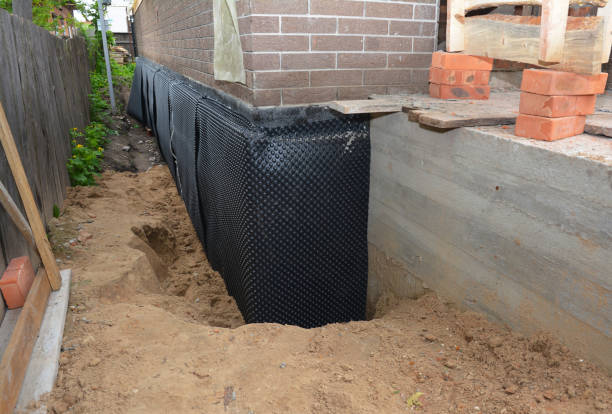 SJ Waterproofing Pros technician performing targeted Exterior Waterproofing assessment in Marion, NC
